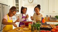 mom_making_pizza_w_daughters_m_1000000845_1720123825.jpg